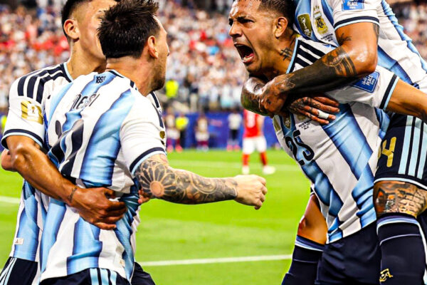 Lionel Messi celebrating with teammates/ Getty image