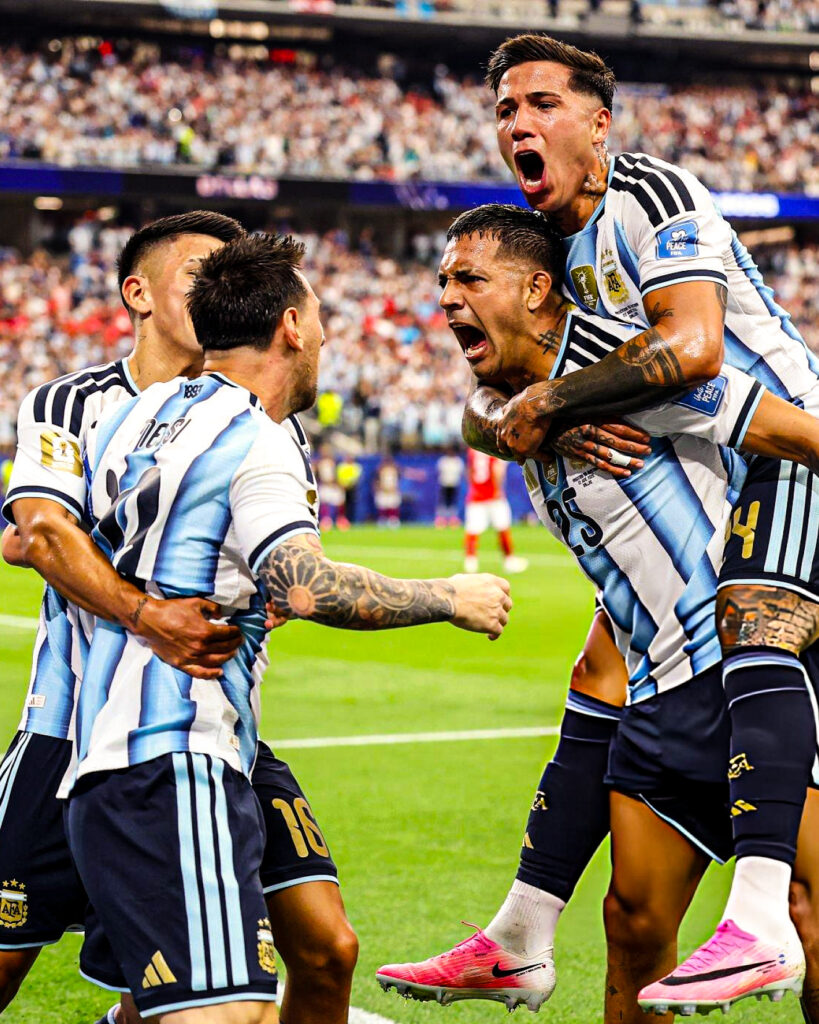 Lionel Messi celebrating with teammates/ Getty image